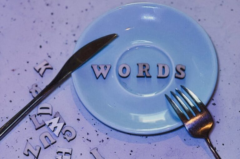 Artistic display of letters spelling 'WORDS' on a plate with creative layout, perfect for typography enthusiasts.