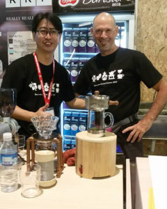 Picture is Ray and Asher demonstrating their Power Roaster at the Singapore Coffee Festival.
